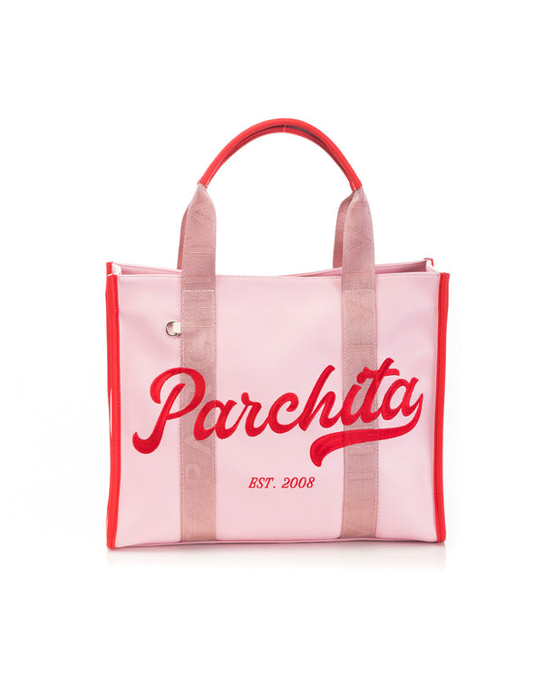 Bolso para mujer en PVC grande con bolsillos internos color rosado y correa ajustable ajustable